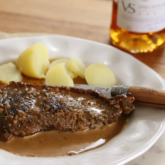 Steak with peppercorn sauce and potatoes from French Cooking Academy.