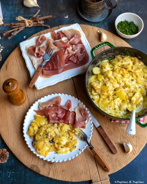 Truffade potatoes and fresh tome served with dry-cured ham.